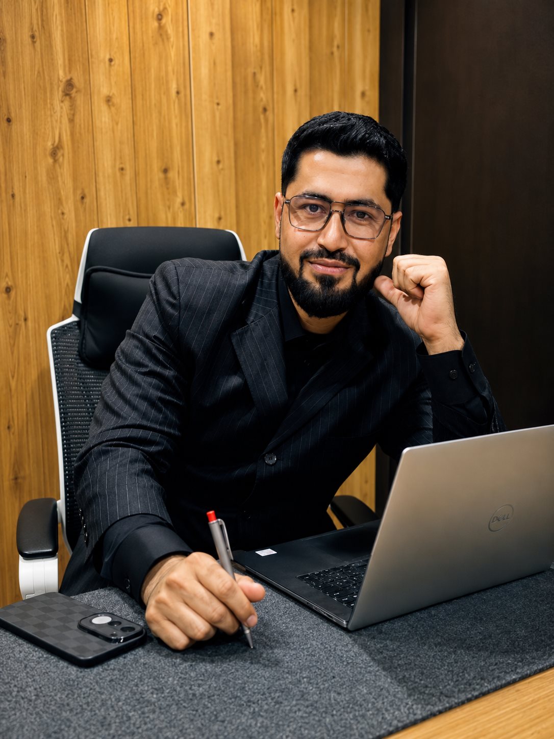 Mehran Khan at his desk